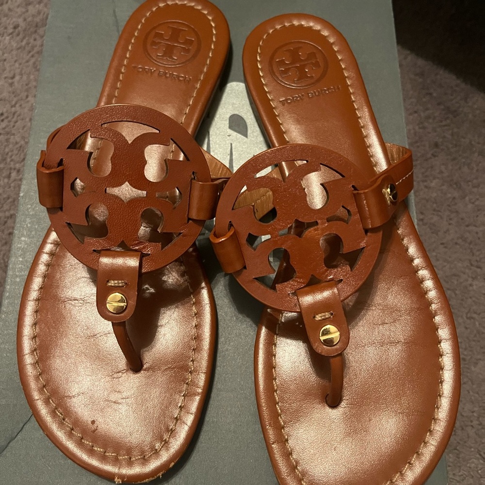 Tory Burch flip flops- some scratches on the front of the sandal